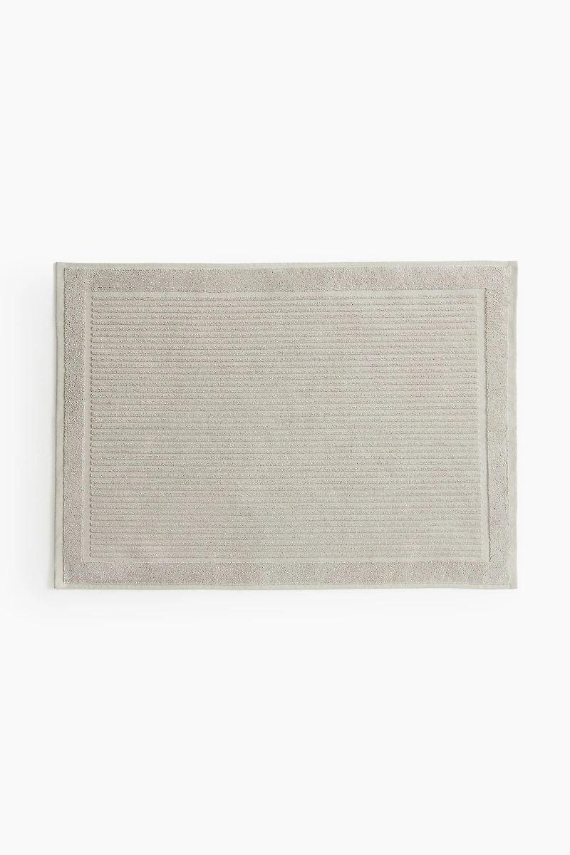 Tapis de bain en coton éponge