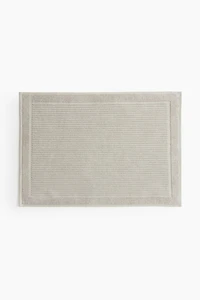 Tapis de bain en coton éponge