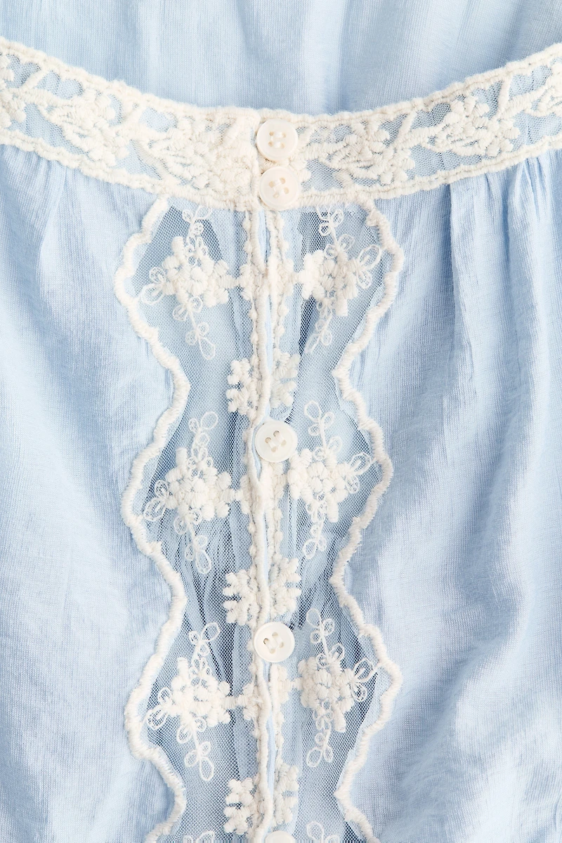 Lace-Trimmed Peplum Top