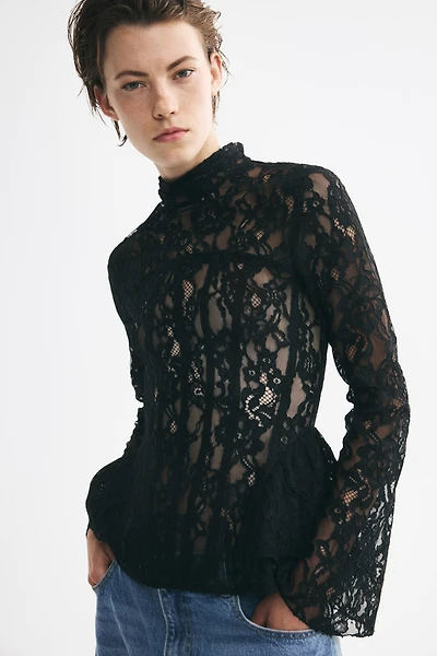 Haut péplum en dentelle