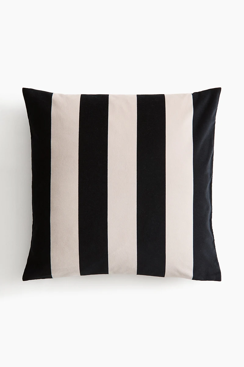 Housse de coussin rayée en velours