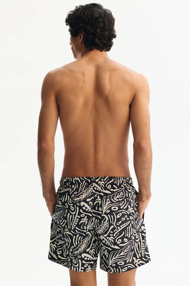 Patterned swim shorts