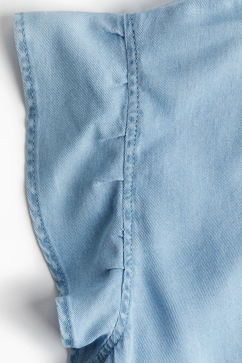 Ruffle-Trimmed Denim Blouse