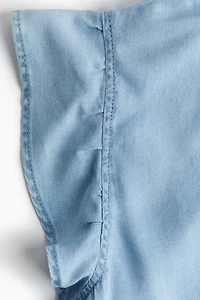 Ruffle-Trimmed Denim Blouse