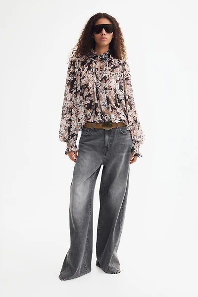 Blouse en mousseline avec manches bouffantes