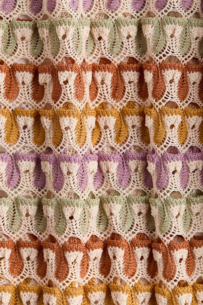 Haut cape d'aspect crocheté