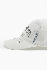 Casquette avec détails fortement usés