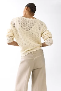Jean large à la cheville taille haute