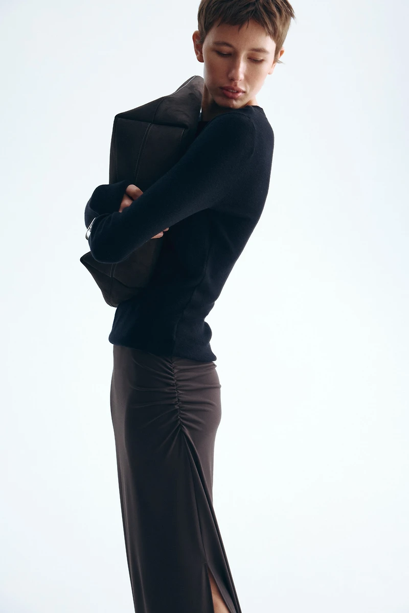 Jupe midi à effet drapé