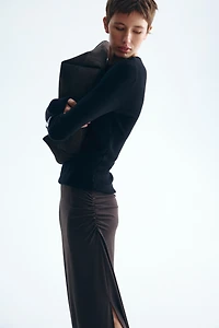 Jupe midi à effet drapé