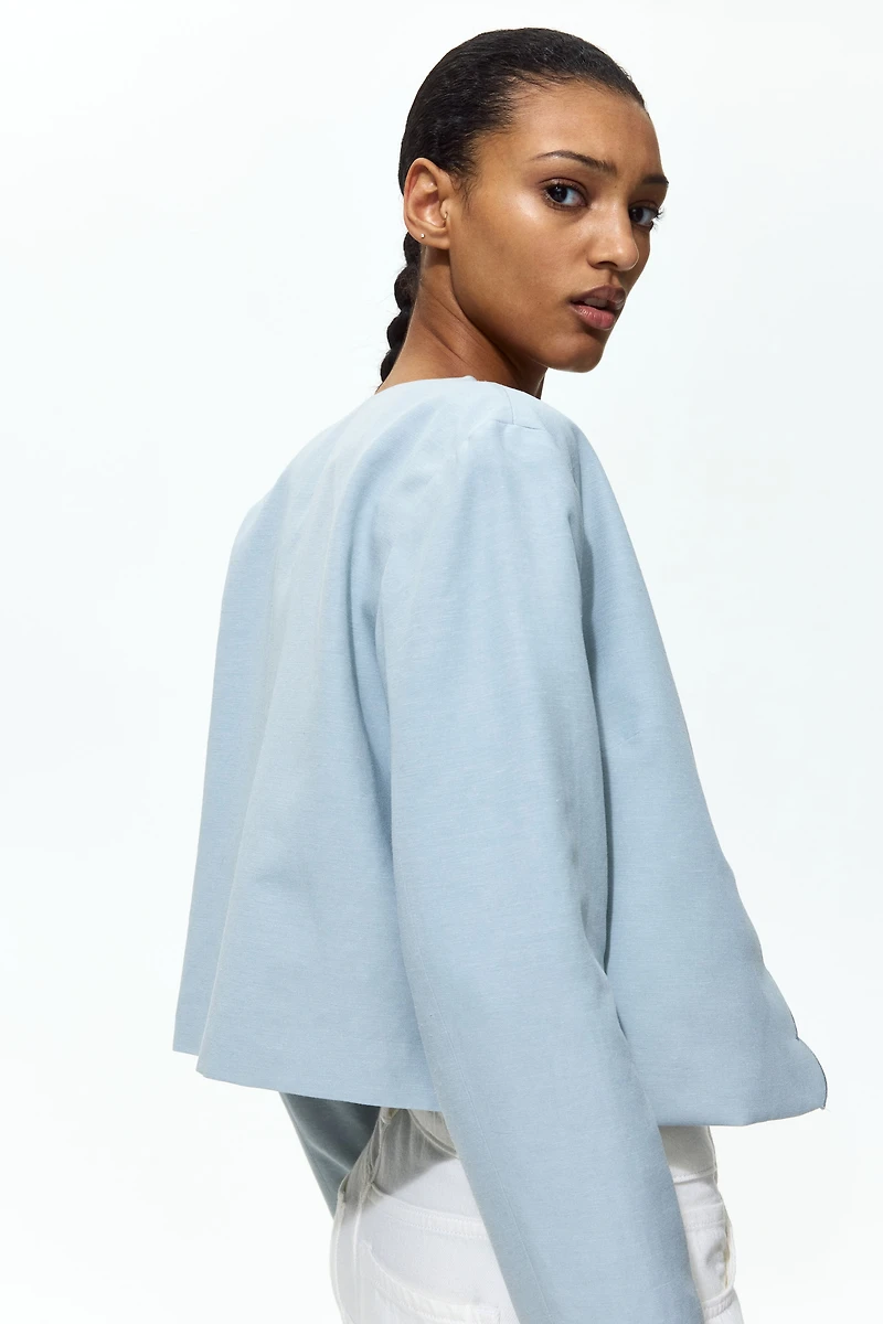 Veste à bords festonnés