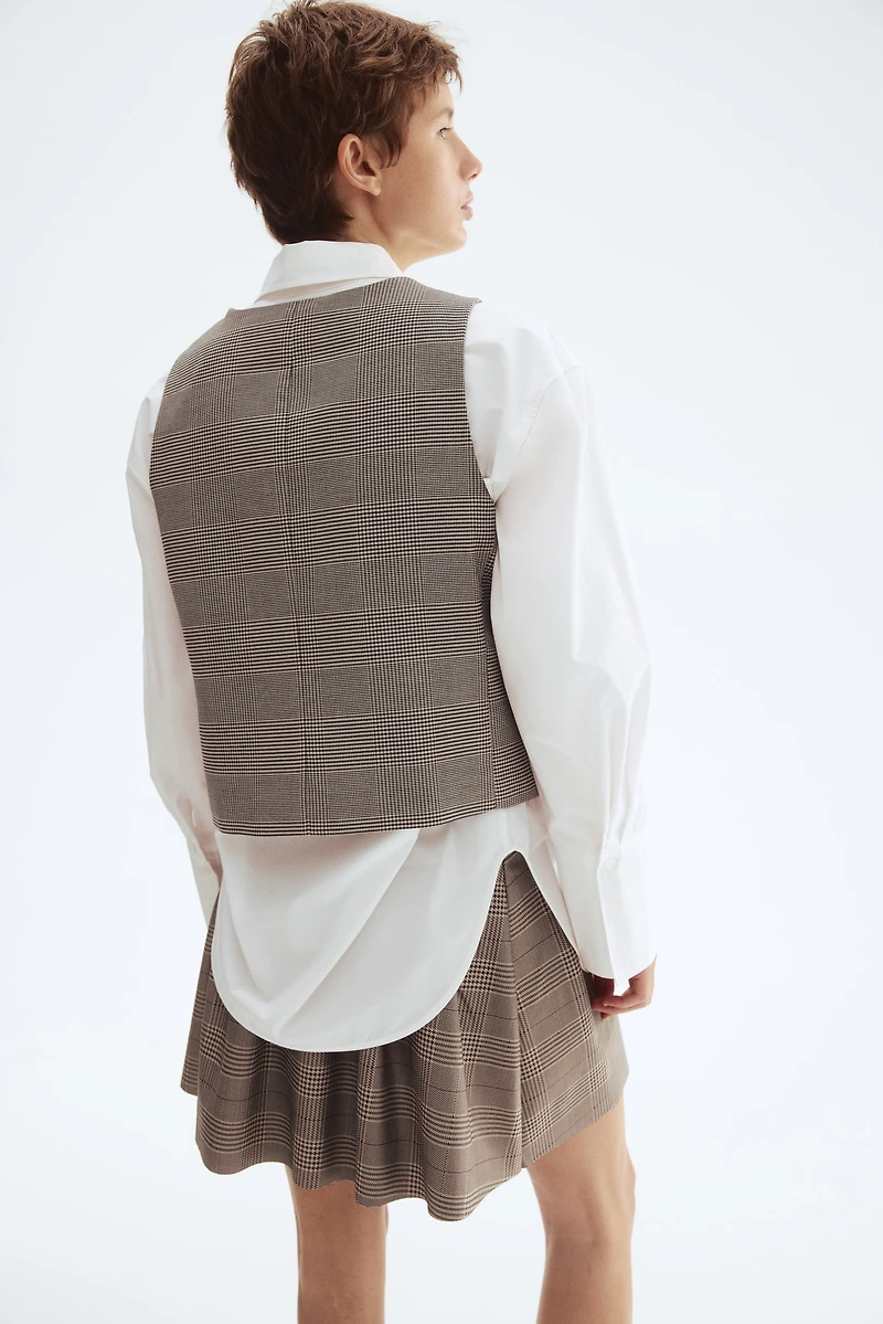 Gilet sans manches à encolure en V