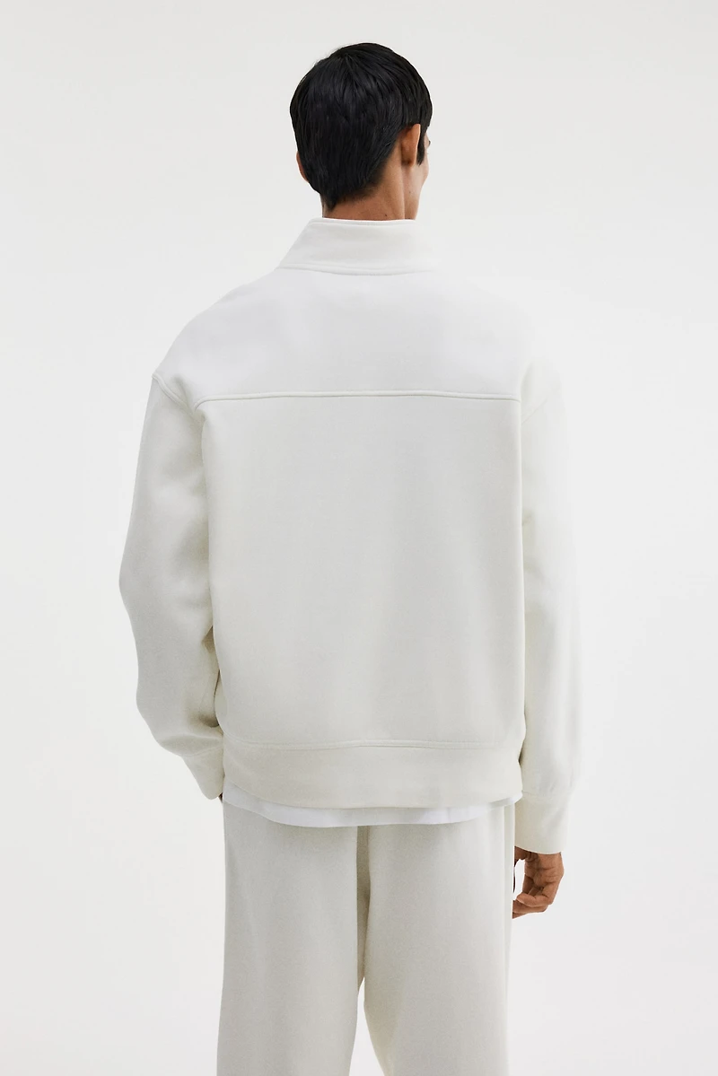 Chandail ample avec col à fermeture éclair