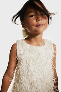 Robe à franges scintillantes