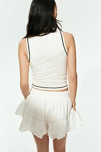 Chandail sans manches en fin tricot