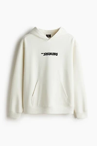 Chandail à capuchon Coupe Flottante