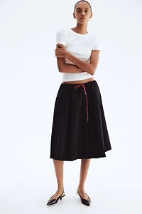 Jupe plissée avec cordon de serrage