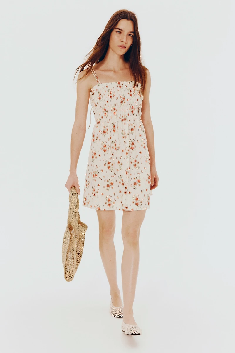 Robe en coton à corsage nid d'abeille
