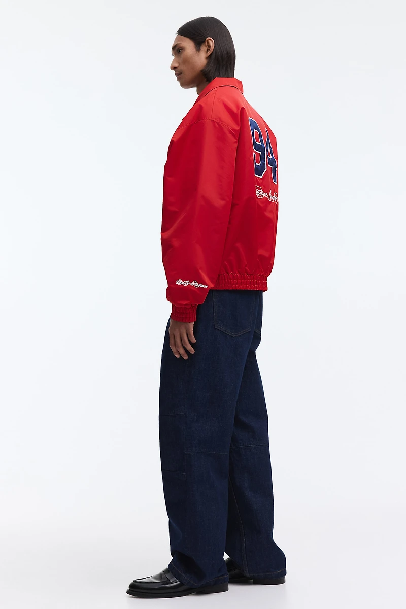 Veste de survêtement brodée ample en nylon