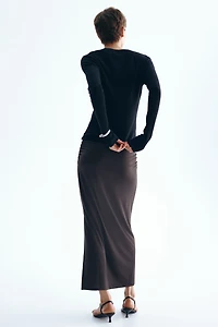 Jupe midi à effet drapé