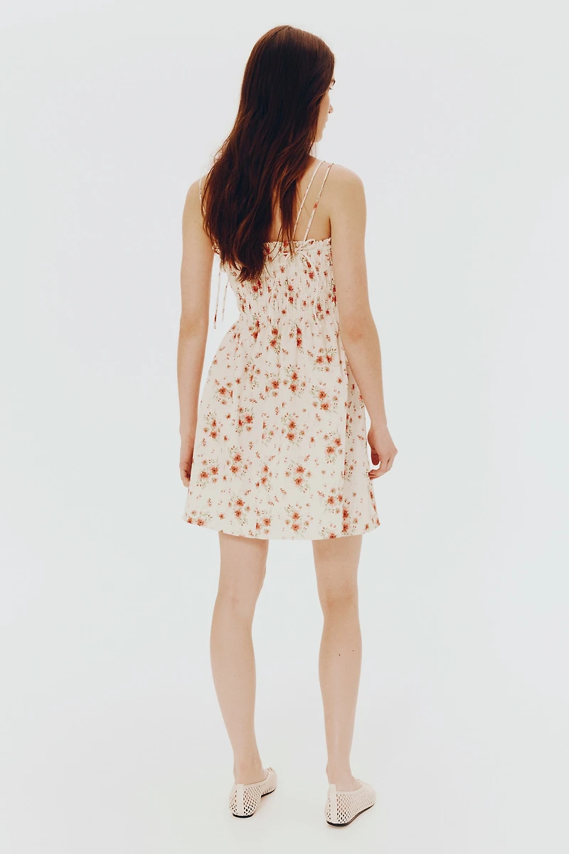 Robe en coton à corsage nid d'abeille