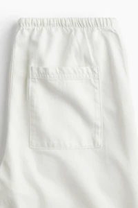 Pantalon en denim avec cordon de serrage