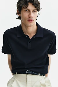 Polo près du corps en tricot gaufré