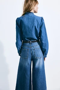 Blouse volantée en denim