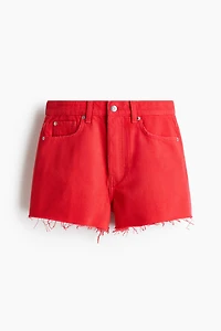 Short en denim avec bords coupés