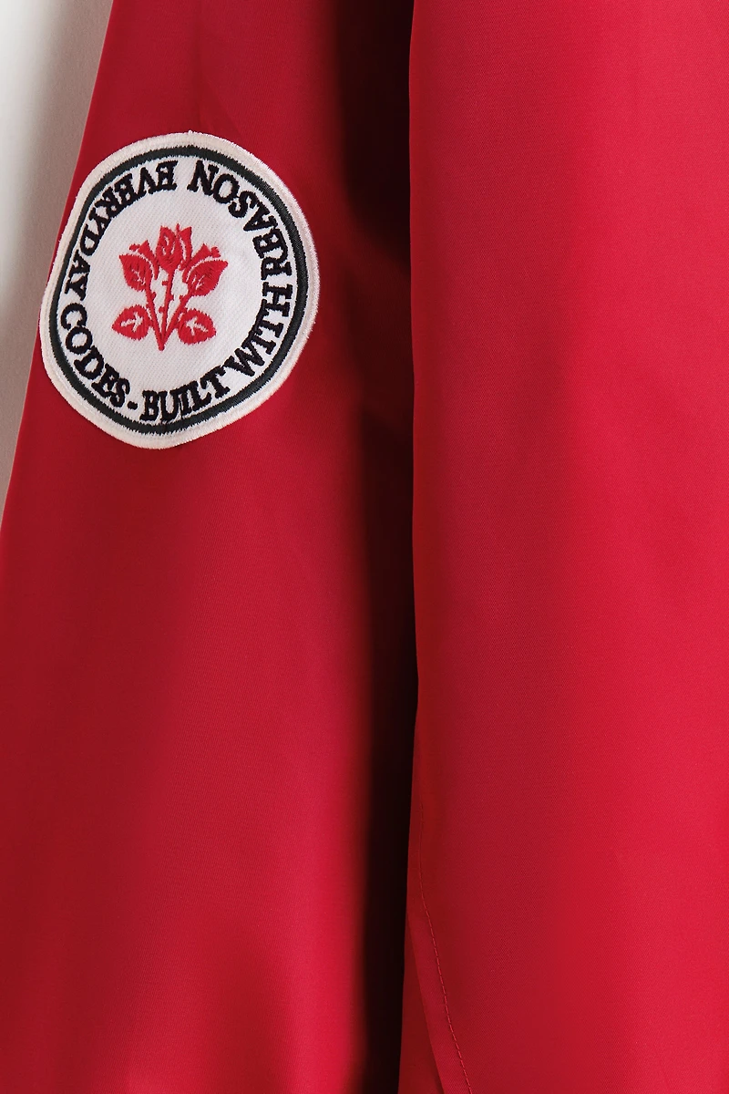 Veste de survêtement brodée ample en nylon