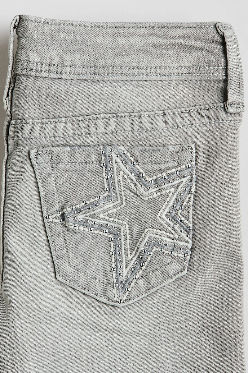 Embroidered-Detail Flared Low Jeans