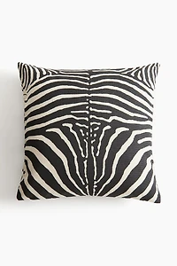 Housse de coussin avec imprimé animal
