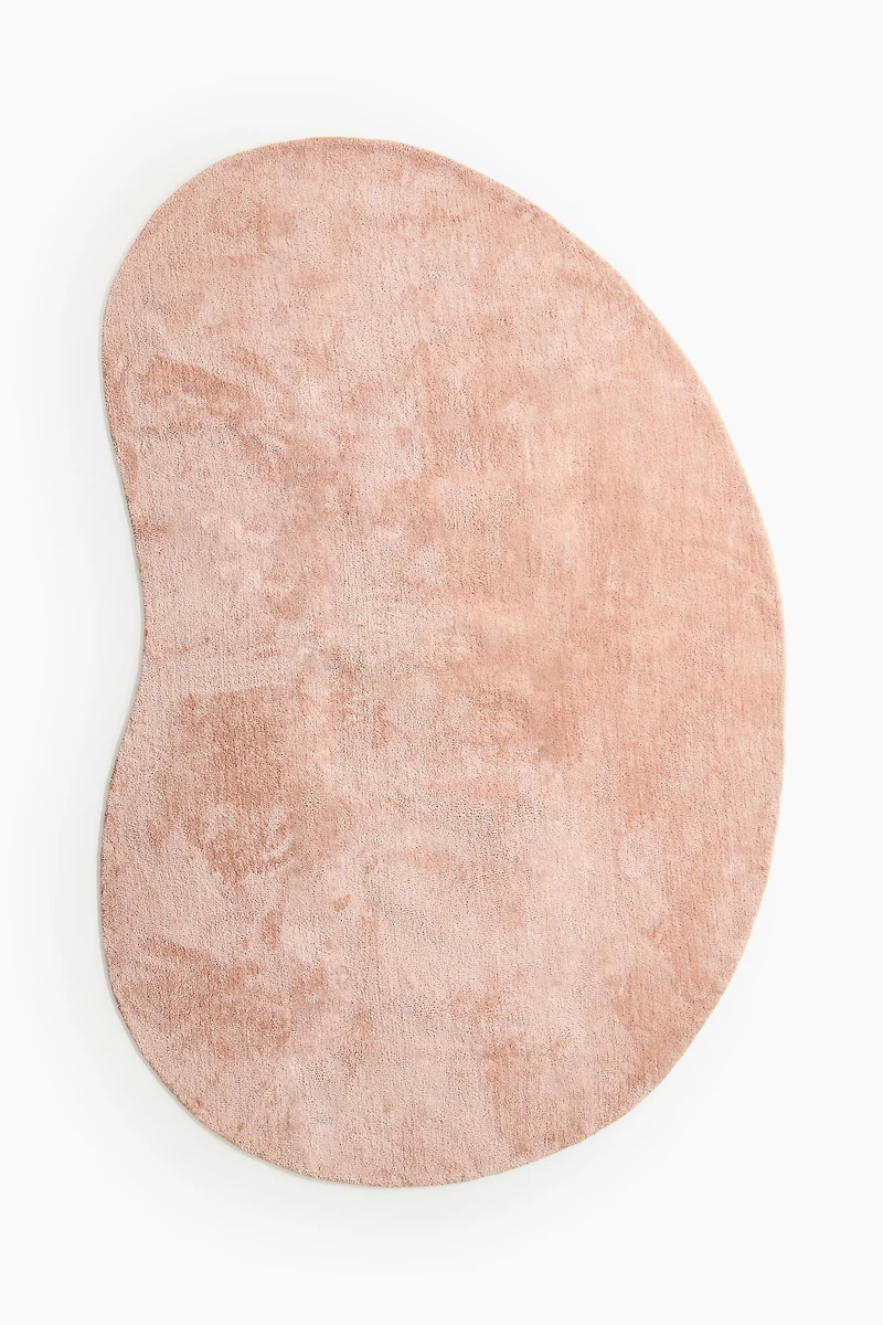 Grand tapis asymétrique