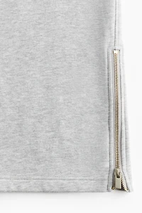Pantalon en molleton à fermeture éclair au bas