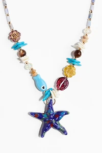 Collier de perles de fantaisie avec pendentif