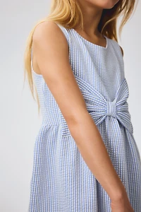 Robe avec boucle devant