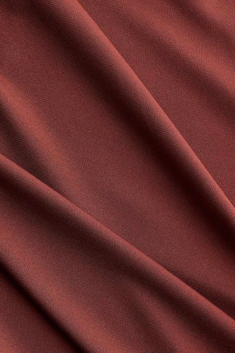 Haut cape asymétrique