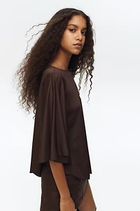 Asymmetric Cape Top