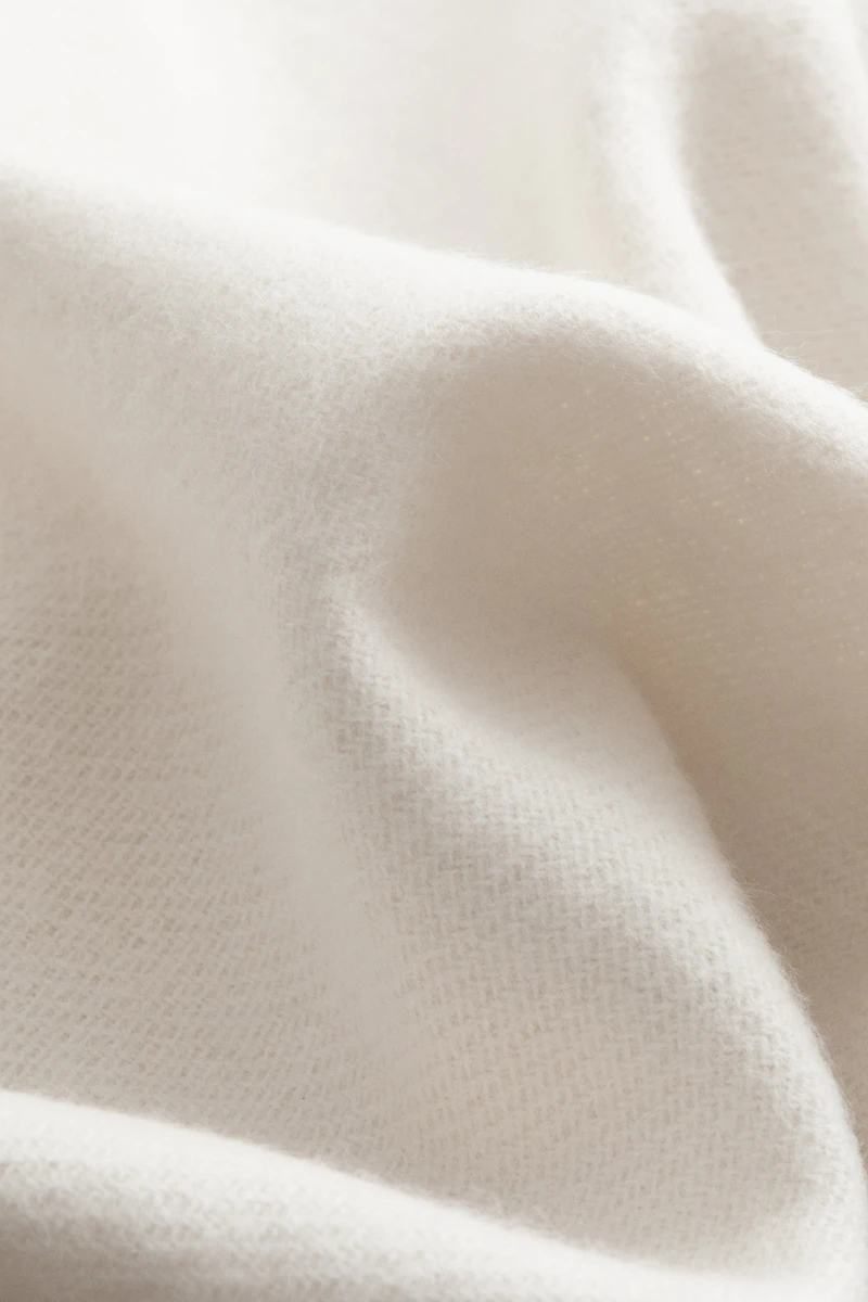 Couverture frangée