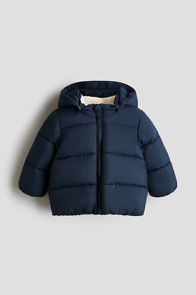 Manteau en duvet déperlant