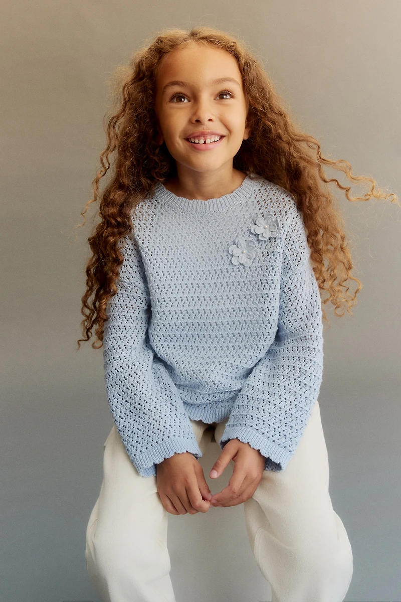 Chandail en tricot de coton ajourée