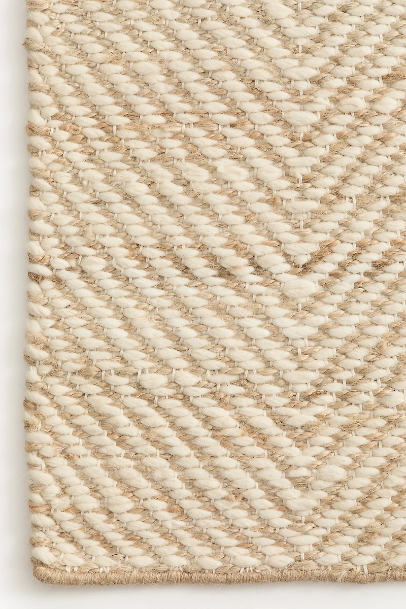 Tapis de couleur en laine mélangée à motif chevron