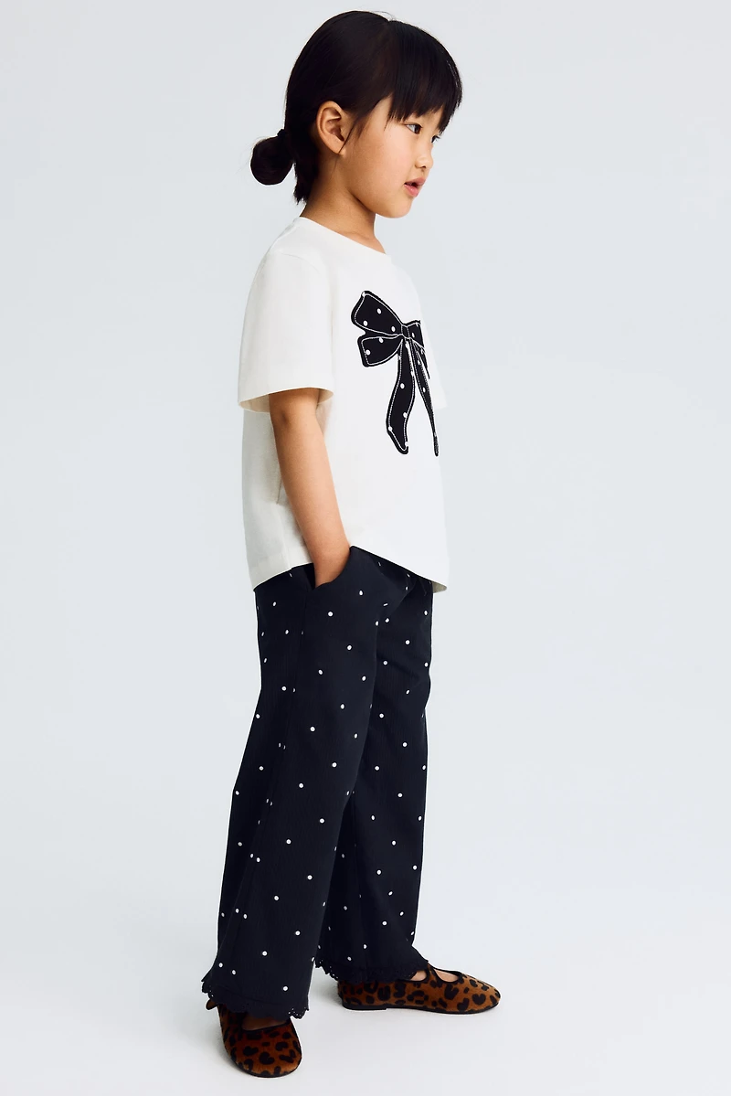 Lace-trimmed seersucker trousers