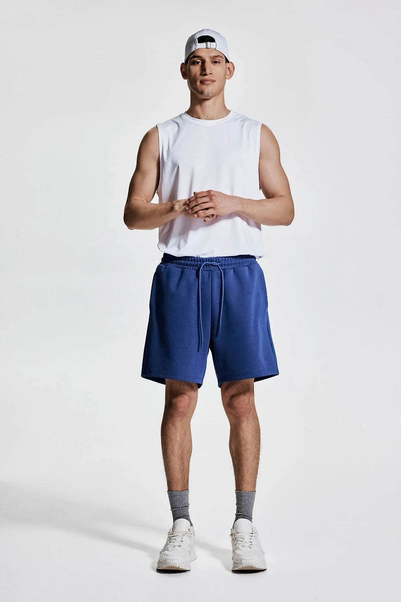 Mid-Length Sports Shorts with DryMove™