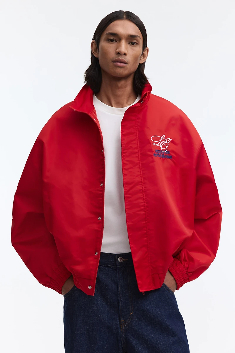 Veste de survêtement brodée ample en nylon