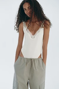 Lace-Trimmed Jersey Bodysuit