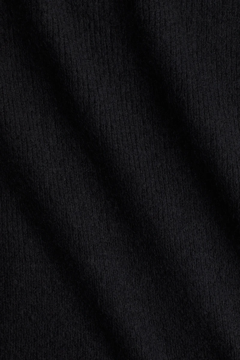 Robe volantée en tricot côtelé