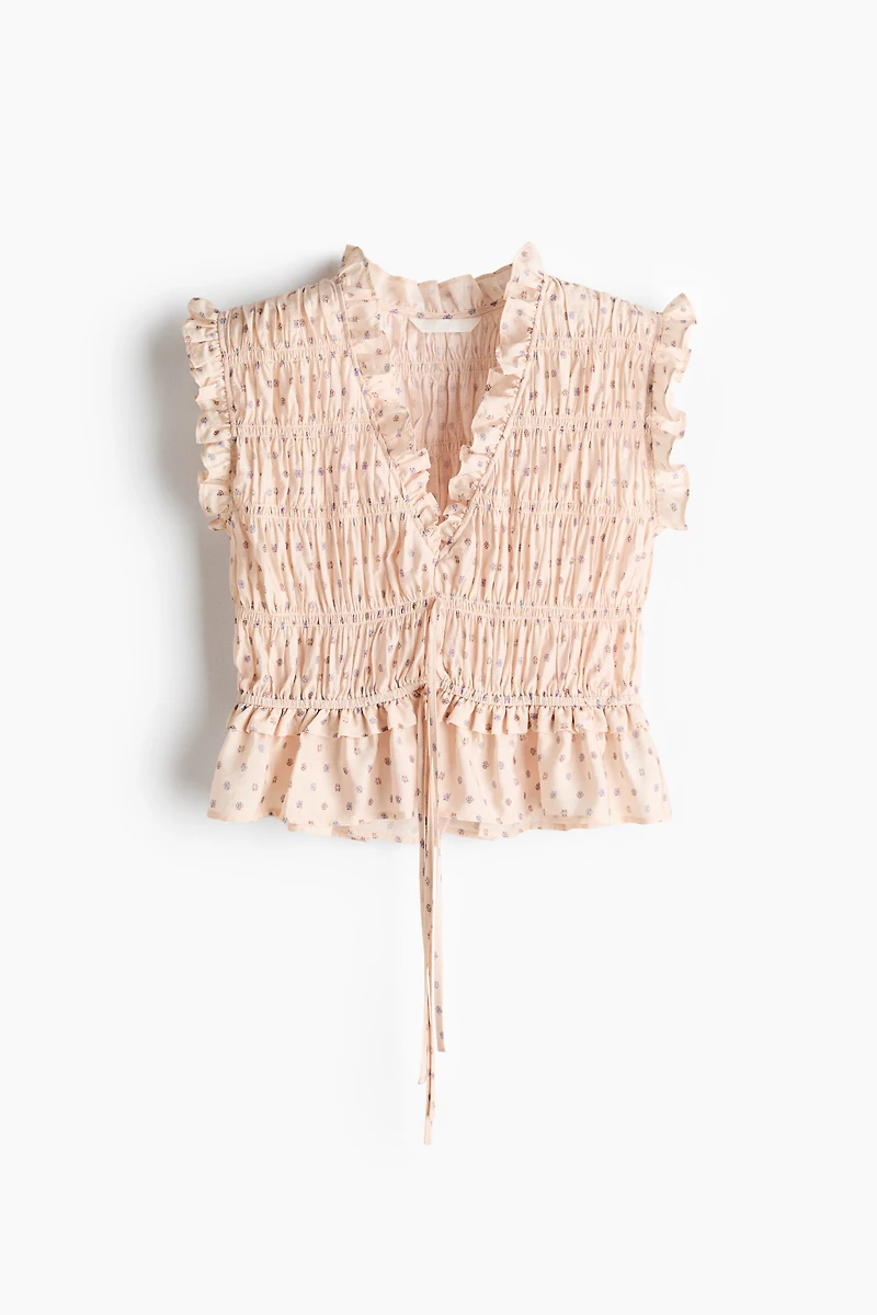 Blouse sans manches en nid d'abeille