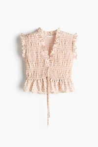 Blouse sans manches en nid d'abeille