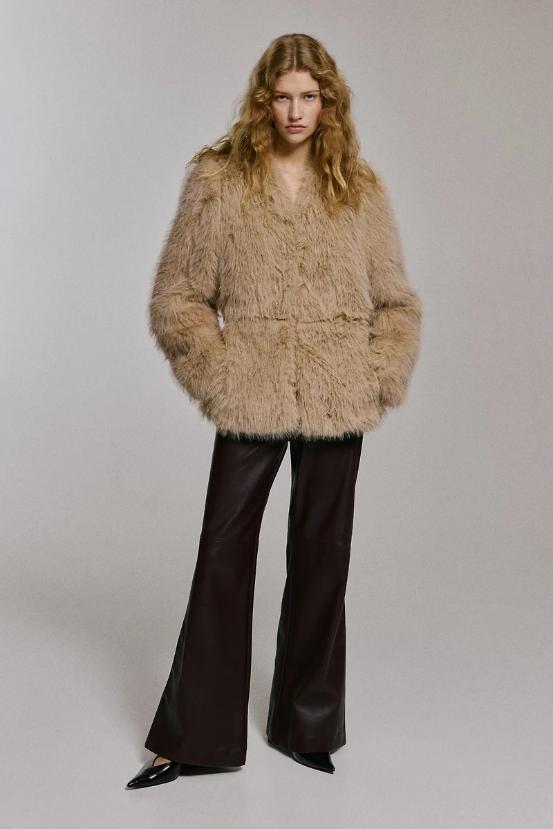 Veste à manches bouffantes